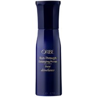 Dark blue Oribe Run-Through Detangling Primer bottle, 175 ml, sleek design with gold text.