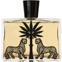 Clear glass bottle with black palm tree and leopard design, containing amber-colored Ortigia Ambra Nera Eau de Parfum.