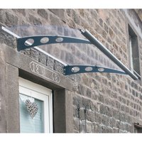 Clear arched door canopy with black brackets and circular cutouts, mounted above a stone doorway.