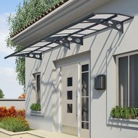 Black Palram Canopia Herald 4460 door canopy with arched polycarbonate panels and decorative support brackets.