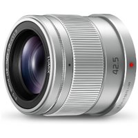 Silver Panasonic MILC telephoto lens with textured grip and 42.5mm marking.