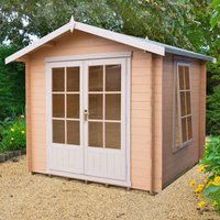 Wooden log cabin summerhouse with double glass doors, side window, and apex roof, set on gravel with garden backdrop.
