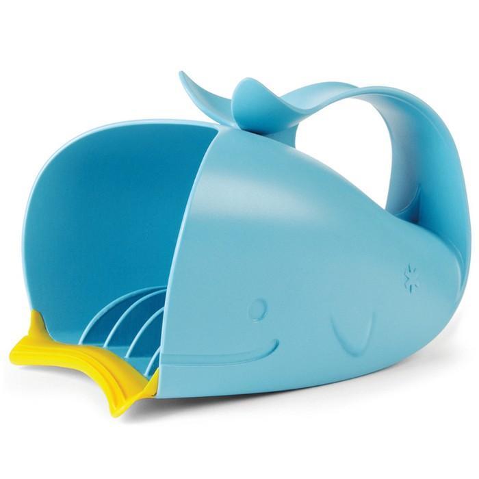 Blue whale-shaped bath rinser with a yellow scoop, made of rubber material, featuring a drainable design and a friendly face for fun bath time.