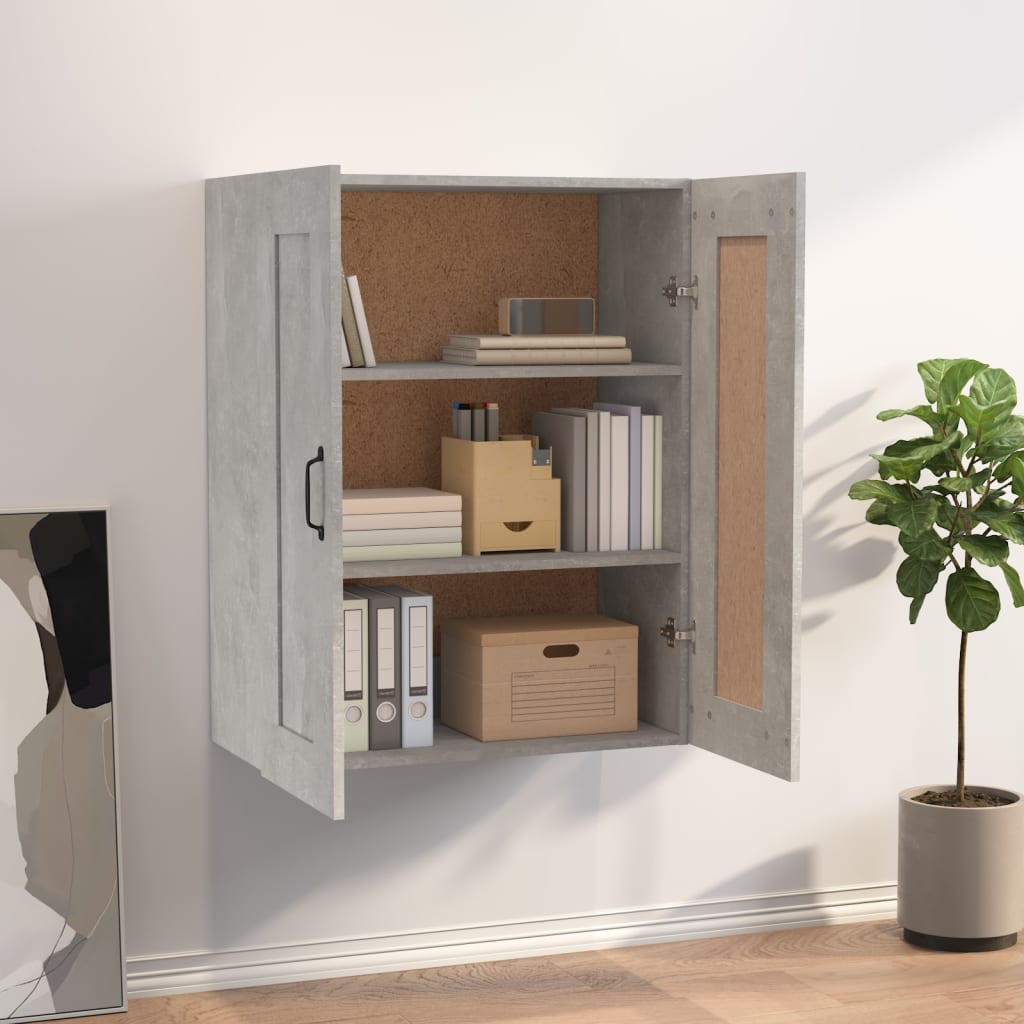 Concrete grey wall cabinet with two doors, featuring a cork back, three shelves, and a sleek design, complemented by a nearby potted plant and framed artwork.