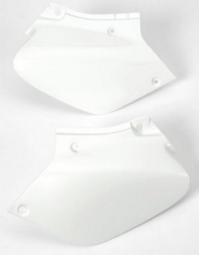 White plastic side panels designed for Honda XR 250/400R models from 1996 to 2004, featuring smooth surfaces and multiple mounting holes for easy installation.