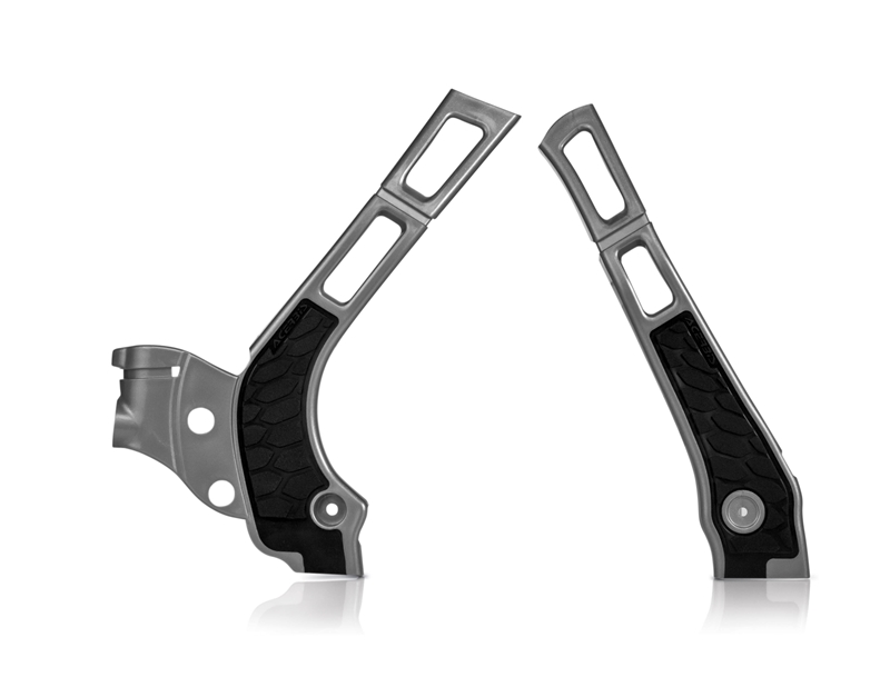 Acerbis X-Grip frame protectors in silver and black, featuring a textured rubber grip and a sleek aluminum design with cutouts for lightweight performance.