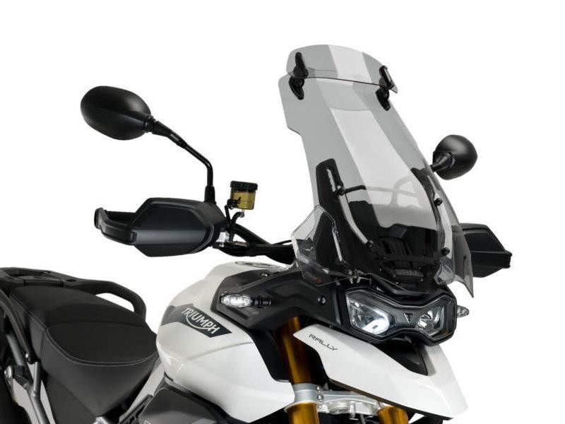 Light smoke Puig Touring Screen with extender for Triumph Tiger 900 (2020-2023), featuring a sleek design, durable material, and adjustable height for enhanced wind protection.