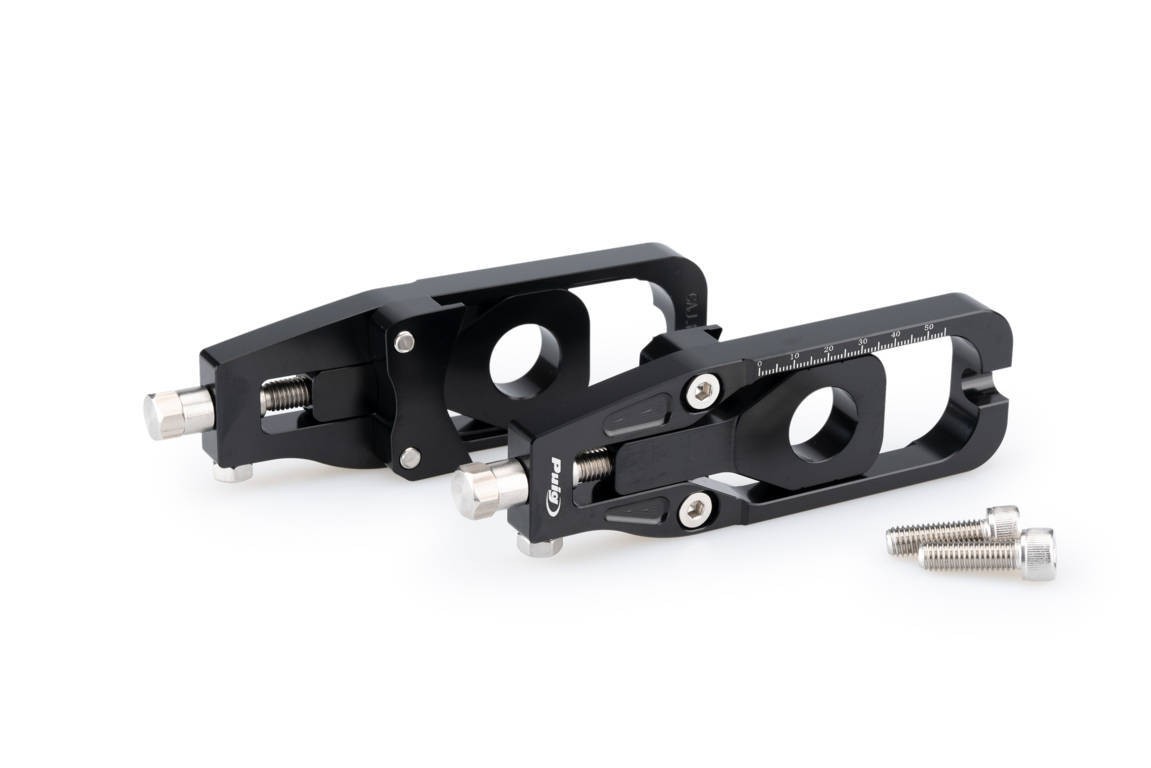 Black aluminum Puig chain tensioner for Kawasaki Versys 1100 SE 25, featuring an adjustable design with a measuring scale and accompanying screws.