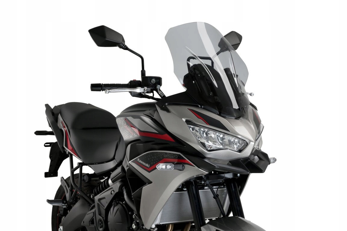 Light smoke Puig Touring Screen designed for Kawasaki Versys 650 (2022-2025), featuring a sleek, aerodynamic shape and durable material, enhancing wind protection and visibility.