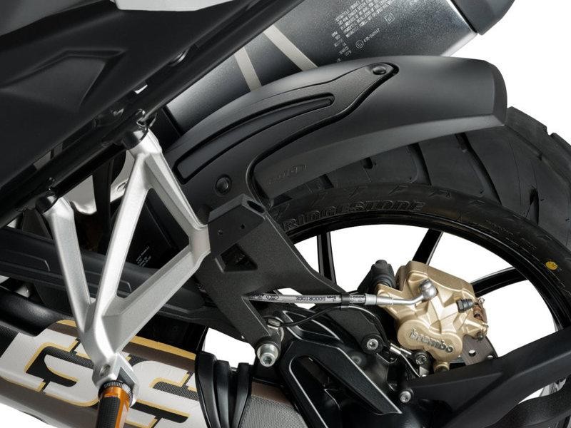 Puig Hugger for BMW R1300 GS 2023-2025 in carbon look, featuring a sleek black design, durable material, and integrated mounting points for easy installation.