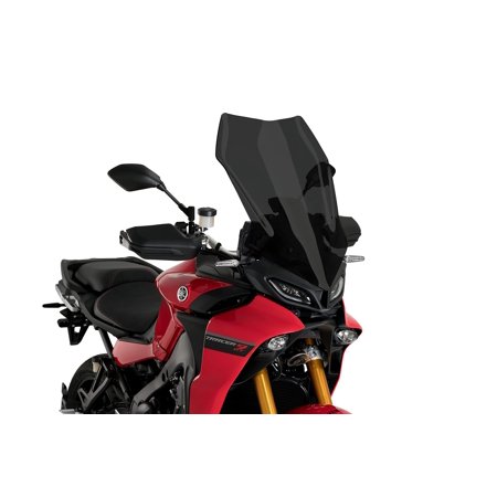 Puig Touring Screen for Yamaha Tracer 9 (2021-2024) in dark smoke, featuring a sleek, aerodynamic design, enhancing wind protection on a red motorcycle.