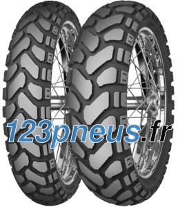 Black rubber motorcycle tire with a rugged tread pattern, designed for off-road performance, featuring a dual-compound construction for enhanced grip and durability.