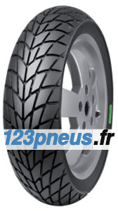 Black motorcycle tire with a tread pattern designed for wet conditions, featuring a silver alloy wheel and a green marking on the rim, labeled as Mitas MC20 Monsum.