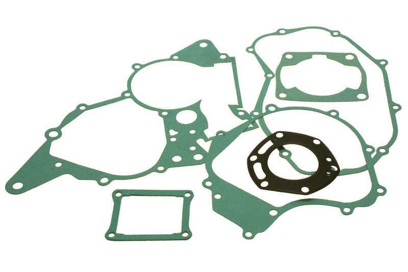 Complete engine gasket set featuring various shapes and sizes, made from green and black rubber materials, with multiple holes for secure fitting in engine assembly.