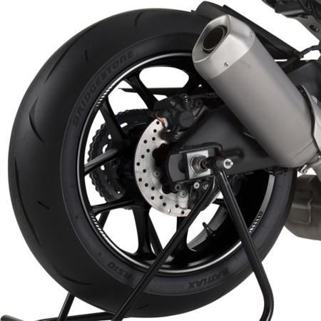 White Puig Premium Rim Tape designed for KTM 1050 Adventure (2015-2016), showcasing a sleek motorcycle wheel with a black rim and a visible brake disc.