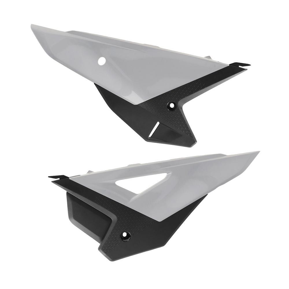 Polisport side panels in white and black, designed for Honda CRF250R, CRF250RX, CRF450R, and CRF450RX 2025 models, featuring a sleek, aerodynamic shape and textured accents.