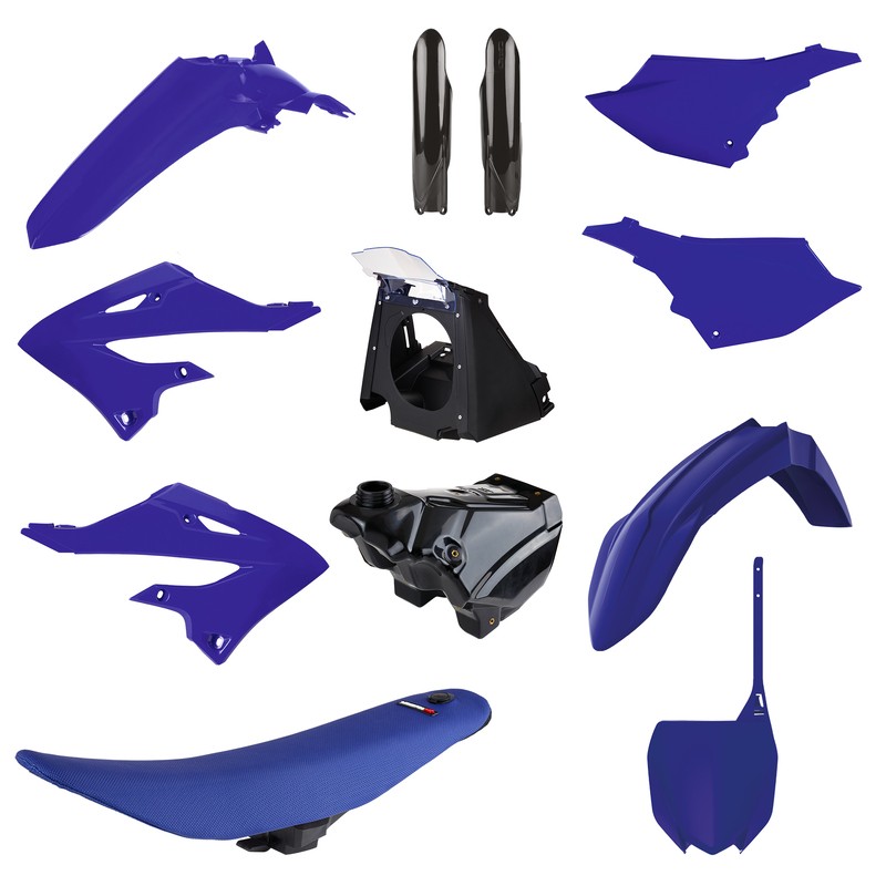 A collection of motorcycle body parts in vibrant blue plastic, including fenders, side panels, a seat, and a black fuel tank, showcasing a sleek, modern design.