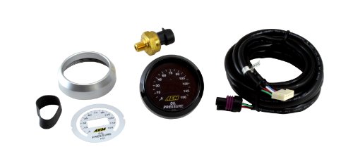 AEM Electronics Gauge Oil Pressure kit includes a black dial gauge with white markings, a brass sensor, a silver mounting bezel, a wiring harness, and installation accessories.