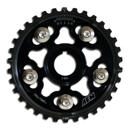 Black aluminum adjustable cam gear with six polished silver bolts and a measurement scale, designed for precise timing adjustments in automotive applications.