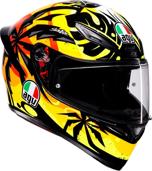 AGV K1 S Tropicrush S26 full-face helmet in black, orange, and yellow with a tropical design, featuring a clear visor and AGV logos, size L.
