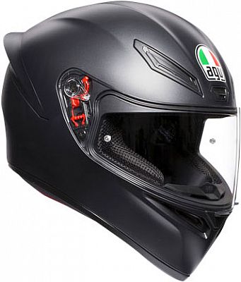 AGV K1 S full face helmet in matte black, size M, featuring a sleek aerodynamic design, clear visor, and distinctive AGV logo with Italian flag colors.
