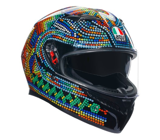 Full face helmet featuring a vibrant black, blue, green, and red design with intricate patterns, AGV logo, and a clear visor, size M.