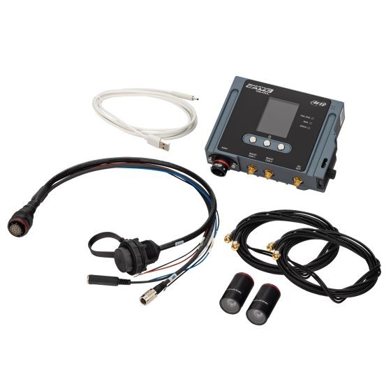 AiM Motorsport SmartyCam 3 Dual HD Camera System featuring a compact gray control unit, two black bullet cameras with 67-degree lenses, various cables, and an external microphone.