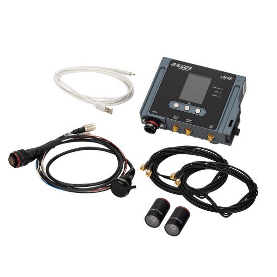 AiM Motorsport SmartyCam 3 system featuring a gray camera unit, two black bullet cameras with 84-degree lenses, and various cables including a harness with an Ethernet connection.