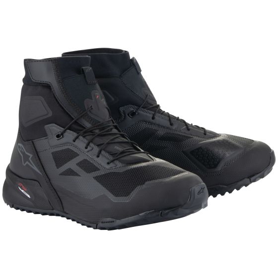 Alpinestars CR-1 motorcycle shoes in black and dark grey, featuring a high-top design, breathable mesh panels, and a durable rubber sole, size UK 12.5 / EUR 47.