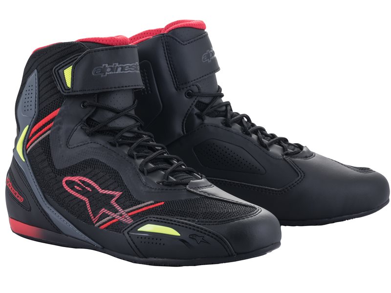 Black and red Alpinestars Faster 3 Rideknit shoes with neon-yellow accents, featuring a mesh upper, padded collar, and a sleek design, size 7 US.