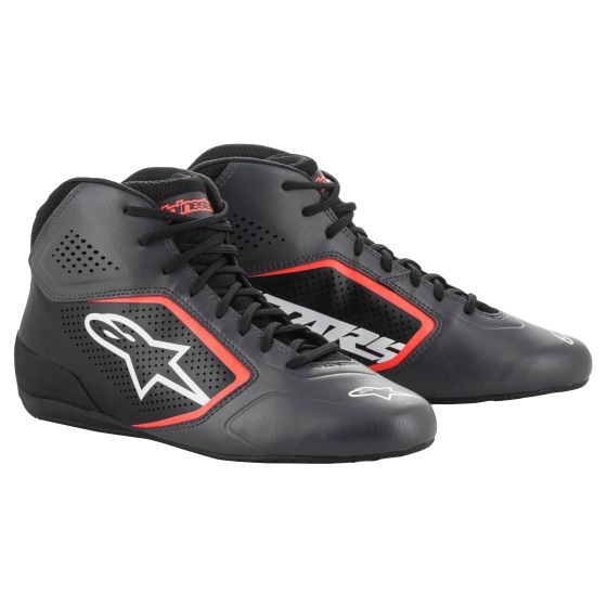 Black and red Alpinestars TECH-1 K START V2 shoes featuring a sleek design, perforated material for breathability, and a prominent white logo on the side.