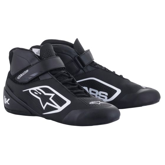 Black and white Alpinestars Tech 1-K V2 kart boots featuring a sleek design, lace-up front, ankle support, and a Velcro strap for a secure fit, size UK 5 / EUR 38.