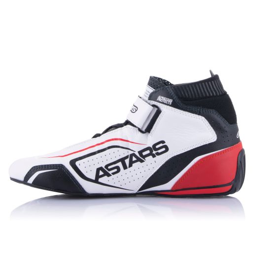 White, black, and red Alpinestars Tech 1-T V3 race boots featuring a sleek design, perforated material for breathability, and a secure Velcro strap.