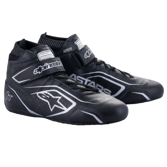 Black and silver Alpinestars Tech 1-T V3 race boots, featuring a sleek design, breathable material, ankle support, and a Velcro strap for secure fit, size UK 8 / EUR 42.