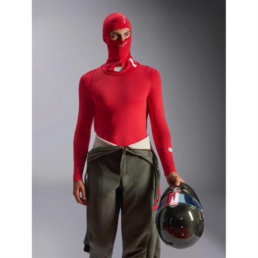 Red Alpinestars ZX Evo V3 FIA/SFI race head sock made of breathable material, featuring a full face design and a snug fit, paired with a racing helmet and fire-resistant suit.