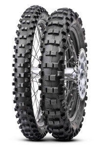 Two Anlas Capra EXT Extra Soft motorcycle tires, featuring a rugged tread pattern, black rubber material, and a size of 140/80-18, designed for off-road use with M+S characteristics.