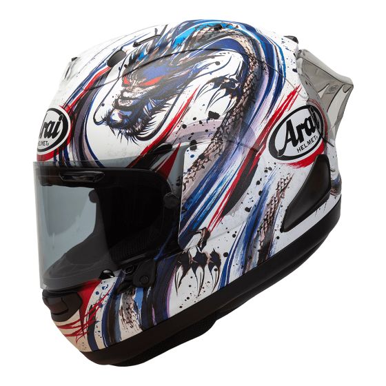 Full face Arai RX-7V Evo Kiyo Trico helmet in white, grey, blue, and red, featuring a striking graphic design and a clear visor, size L.