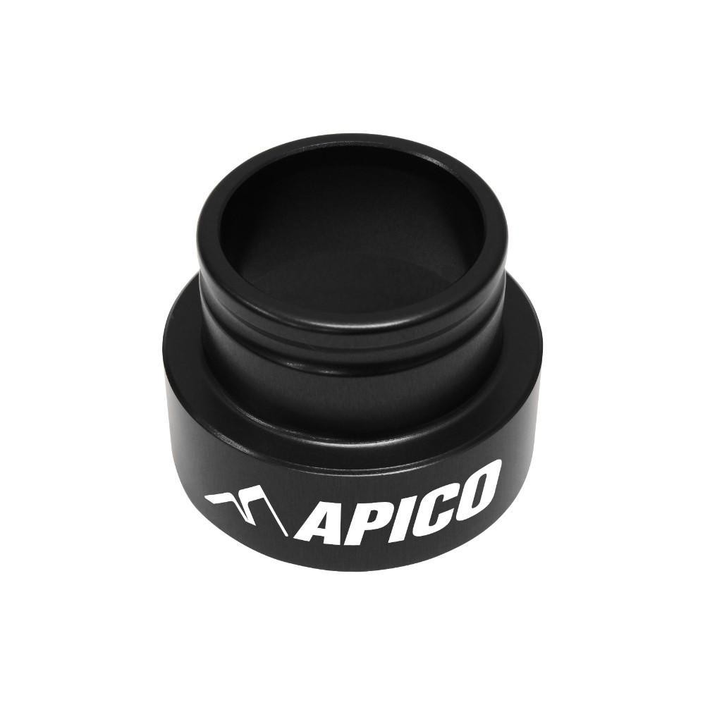 Black aluminum carburettor conversion adapter by Apico, featuring a smooth finish and engraved logo, designed for Gas Gas TXT/TXT Pro/Racing/GP models from 2002 to 2020.