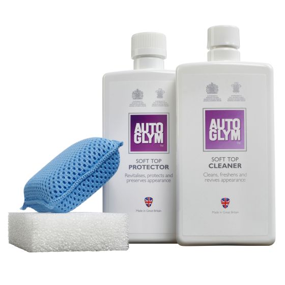 Autoglym Soft Top Clean & Protect Kit featuring a white bottle labeled "Soft Top Cleaner," a white bottle labeled "Soft Top Protector," and two cleaning sponges in blue and white.