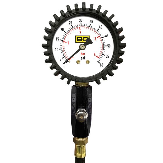 B-G Racing Tyre Pressure Gauge features a 2.5-inch white dial with black markings, a rubberized black casing, and a brass connector for accurate pressure readings in bar and psi.