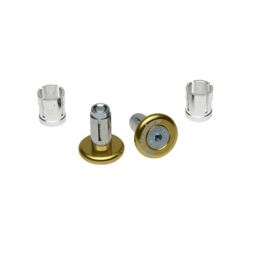 Gold expanding handlebar end plugs by BarkBusters, featuring a shiny finish, with two clear plastic inserts included for installation.