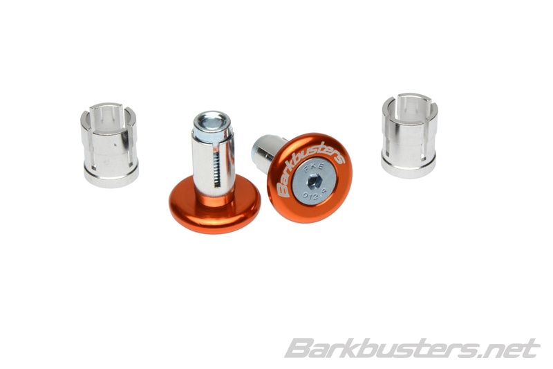 Anodized orange Barkbusters accessory bar end plug set, featuring two round plugs and two silver metal sleeves, designed for motorcycle handlebars.