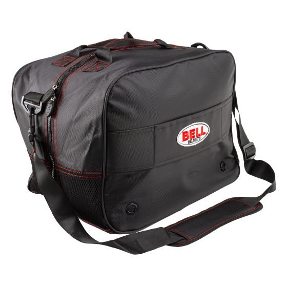 Black Bell Helmet Bag featuring durable fabric, red stitching, a padded shoulder strap, and a prominent white and red Bell logo on the front.