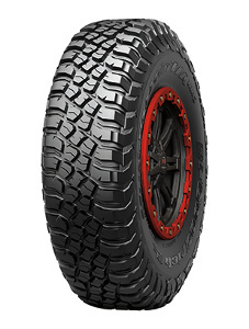 Mud Terrain T/A KM3 tire by BFGoodrich features a rugged black tread with deep grooves for traction, mounted on a black wheel with red accents, designed for off-road performance.