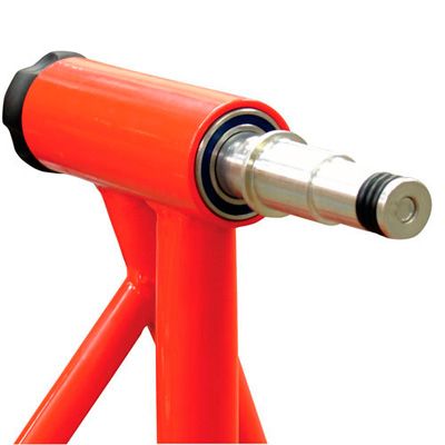 Bright orange metal axle pin with a silver shaft and black rubber seal, designed for use with a side paddock stand, featuring a sturdy construction for durability.