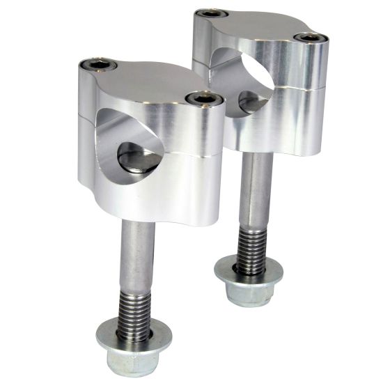 Aluminum CNC handlebar mounting clamps with a silver finish, featuring a smooth design, two mounting bolts, and a circular cutout for secure attachment.