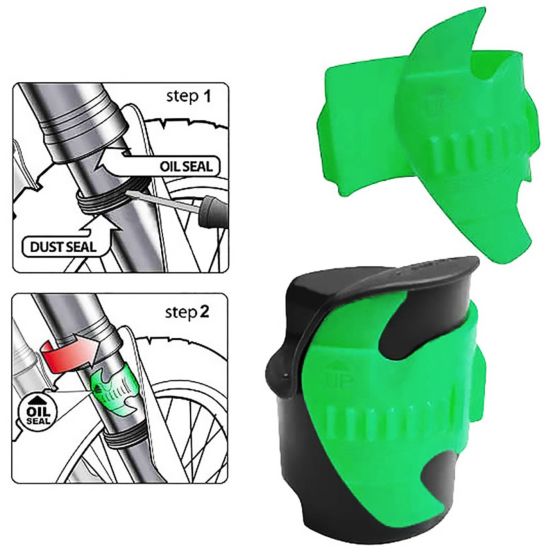Green plastic fork seal scraper with a unique design, featuring grooves for grip and a two-step process illustrated for effective cleaning of bike fork seals.