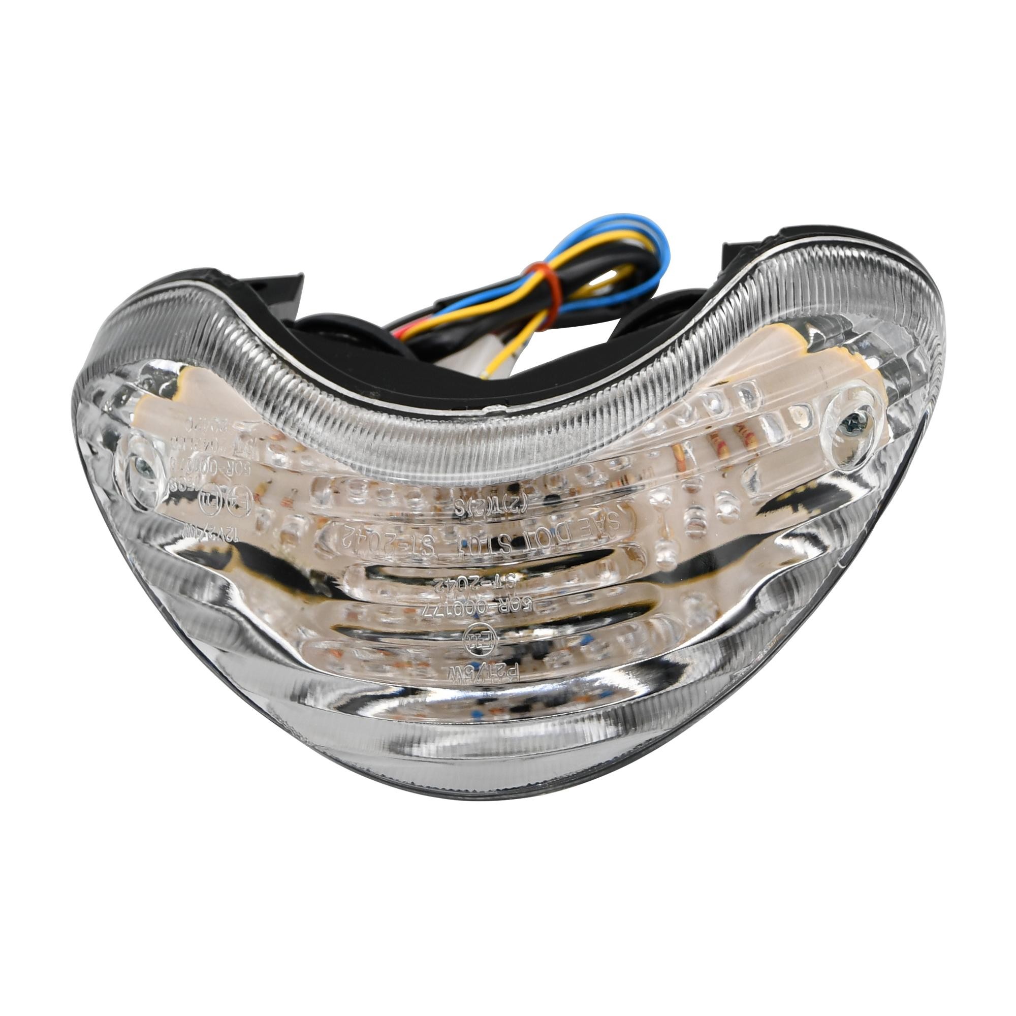 LED rear tail light with a clear lens and integral indicators, featuring a curved design, multiple LED bulbs, and wiring for Suzuki TL1000R models from 1998 to 2004.