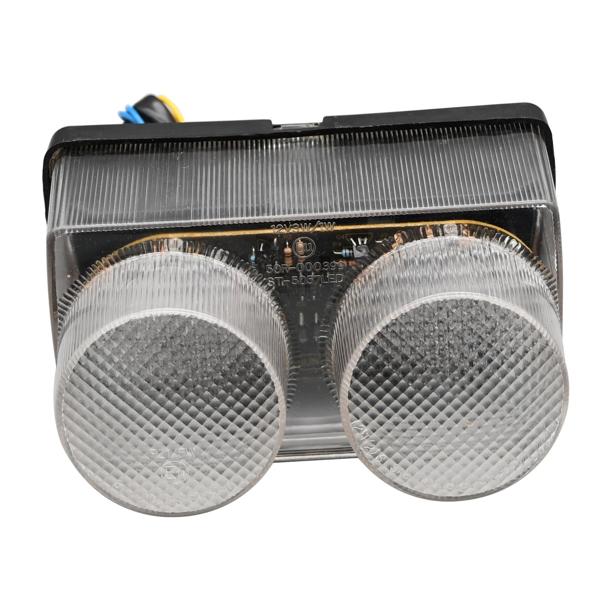 LED rear tail light with clear lens and integral indicators, featuring a sleek black casing and two rounded, textured lenses, designed for Yamaha YZF-R1 models from 1998-1999.