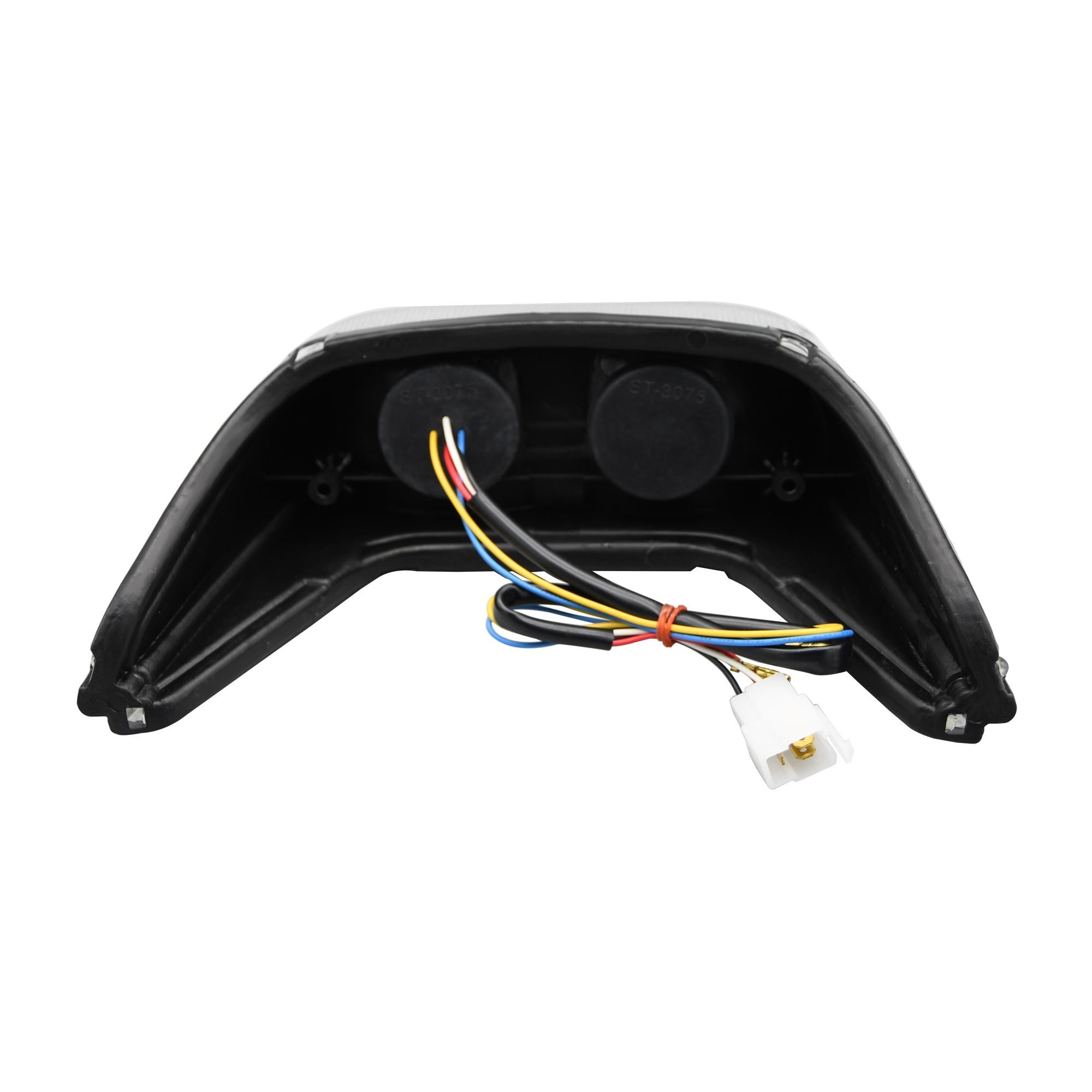 LED rear tail light with clear lens, featuring integral indicators, black plastic housing, and multi-colored wiring for Yamaha YZF-R6 models from 1998 to 2000.